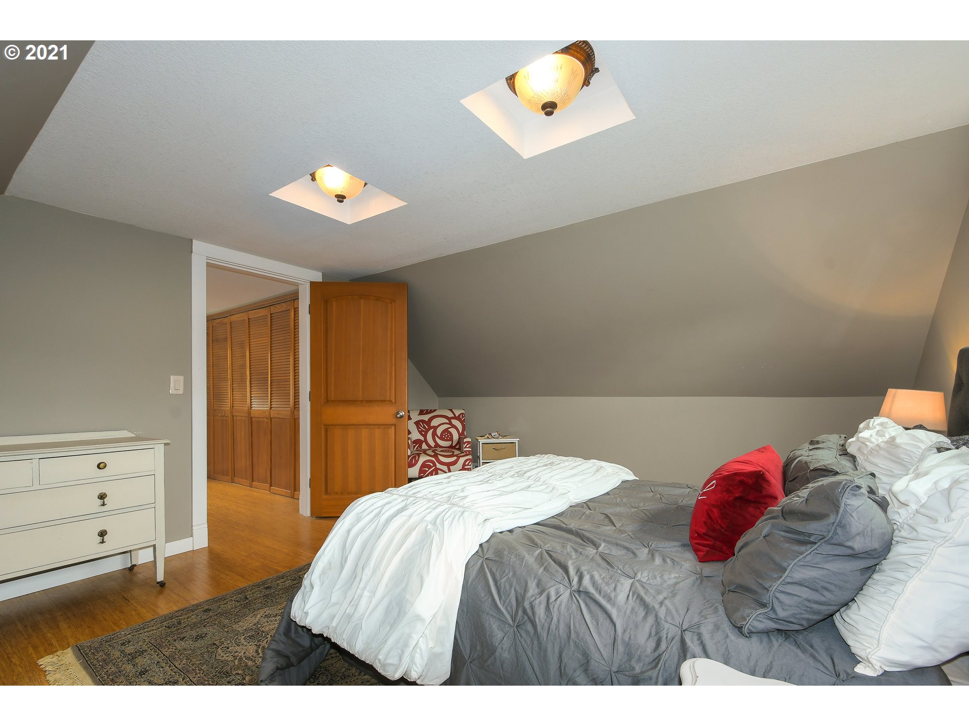 20512 Northeast Risto Road Battle Ground, WA 98604 - Photo 15 of 28 a bedroom with a bed and a window