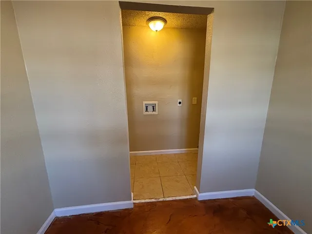a view of a space with a door