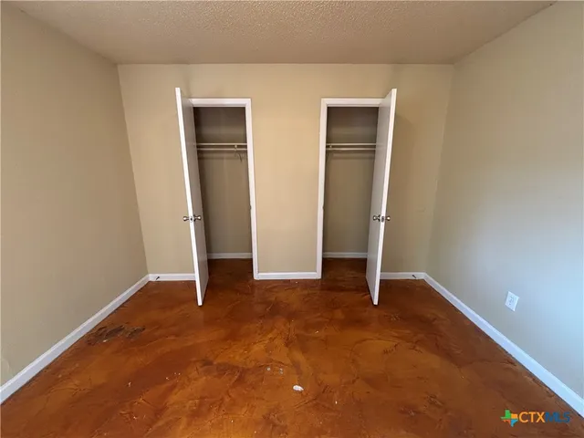 an empty room with closet