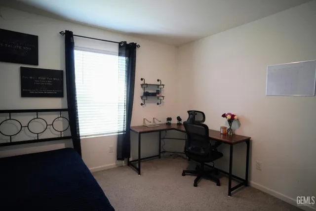 a view of a hallway with wooden walls