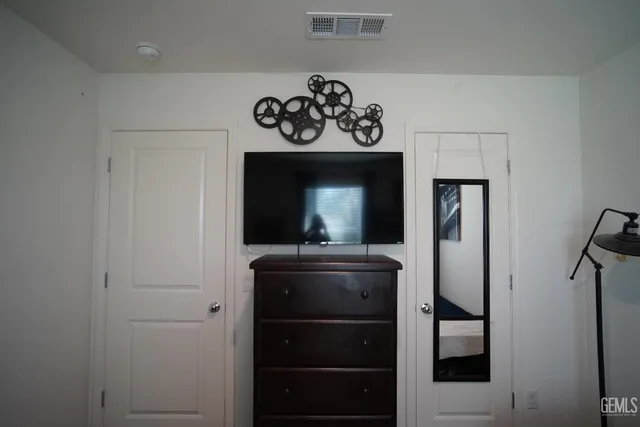 a room with a table and chairs