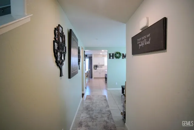 a view of a workspace with furniture