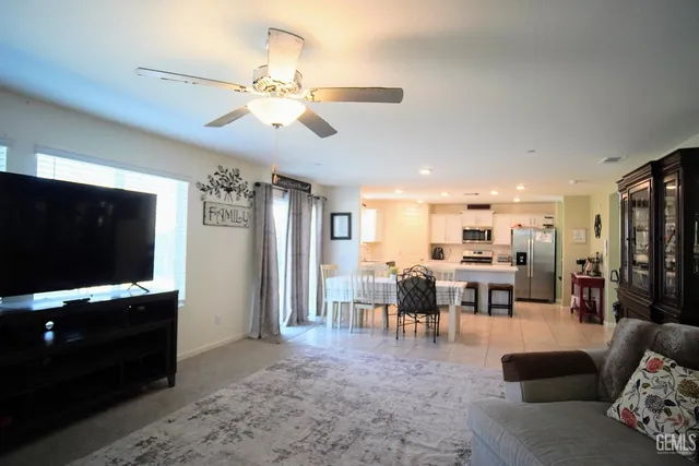 a view of a room with rack on the wall and a window