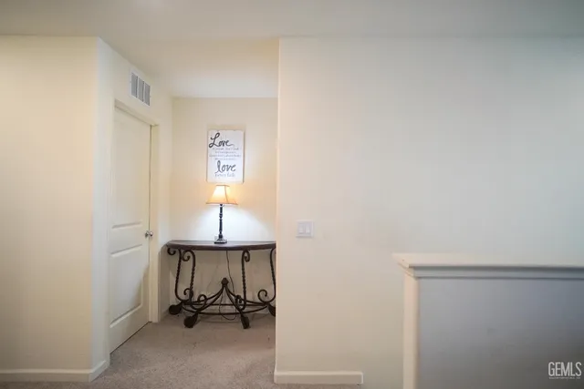 a bedroom with a bed and a tv