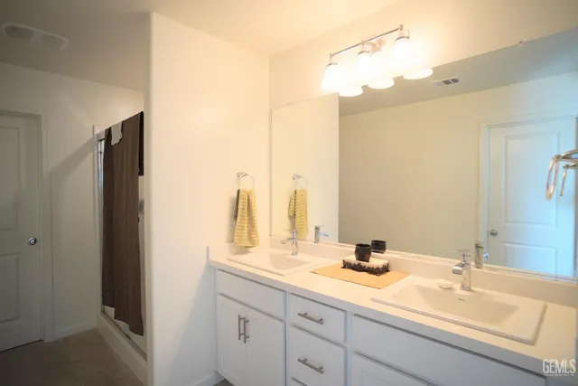 a view of a bathroom from a hallway