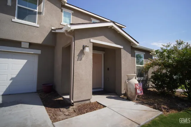 a bathroom with a toilet and a sink