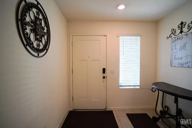 a view of a hallway with workspace