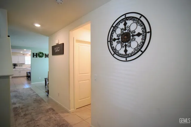 a bathroom with a sink a mirror and shower