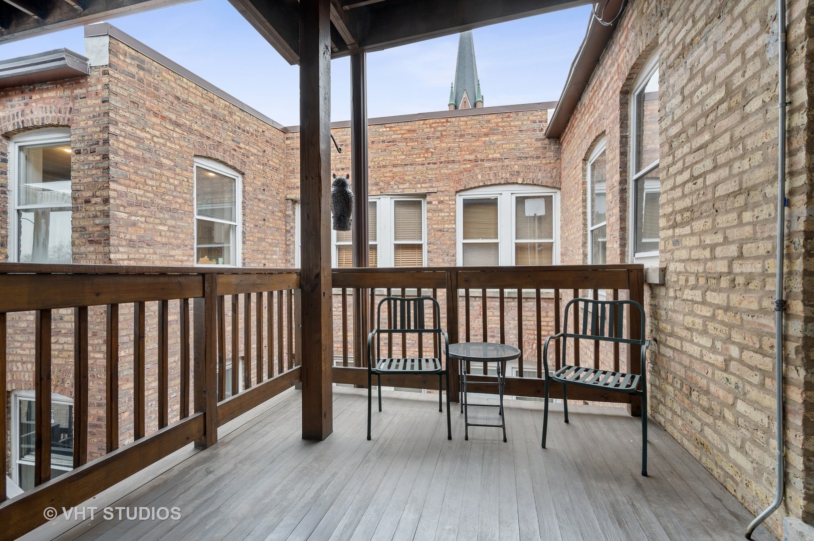 815 Ridge Avenue, Unit 3 Evanston, IL 60202 - Photo 15 of 16 a view of a brick building from a balcony