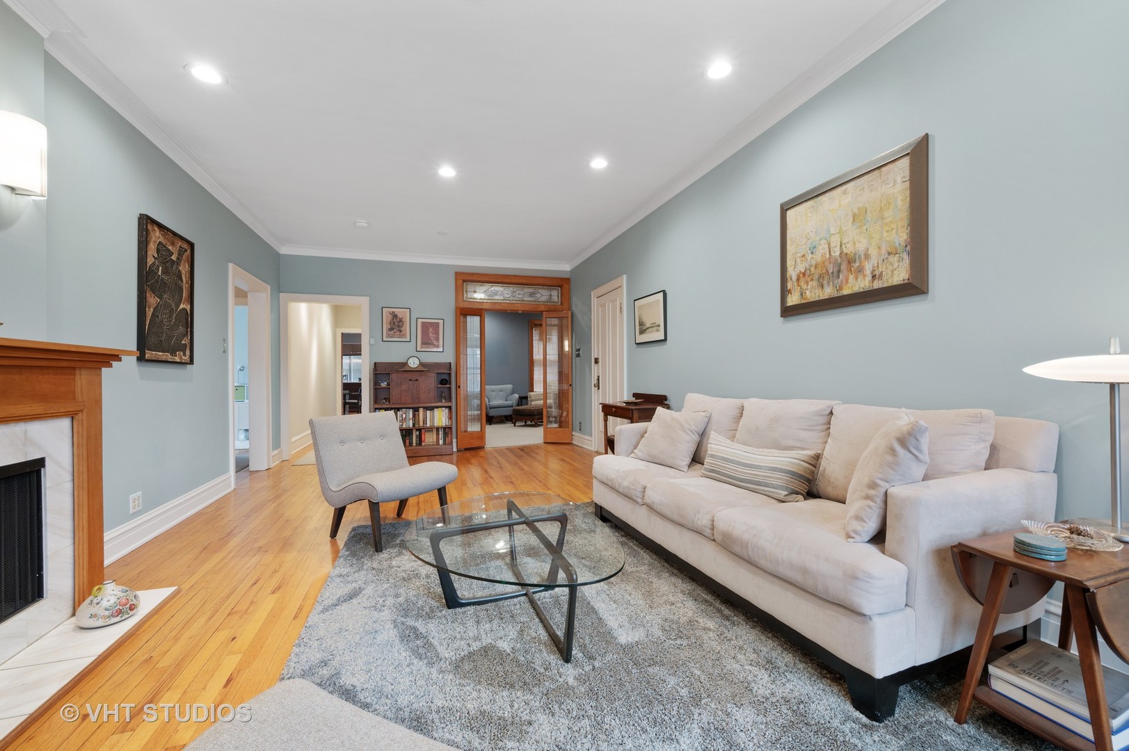 815 Ridge Avenue, Unit 3 Evanston, IL 60202 - Photo 2 of 16 a living room with furniture and a fireplace