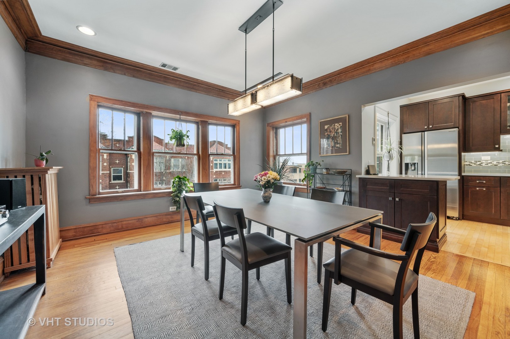 815 Ridge Avenue, Unit 3 Evanston, IL 60202 - Photo 7 of 16 a view of a dining room with furniture and window