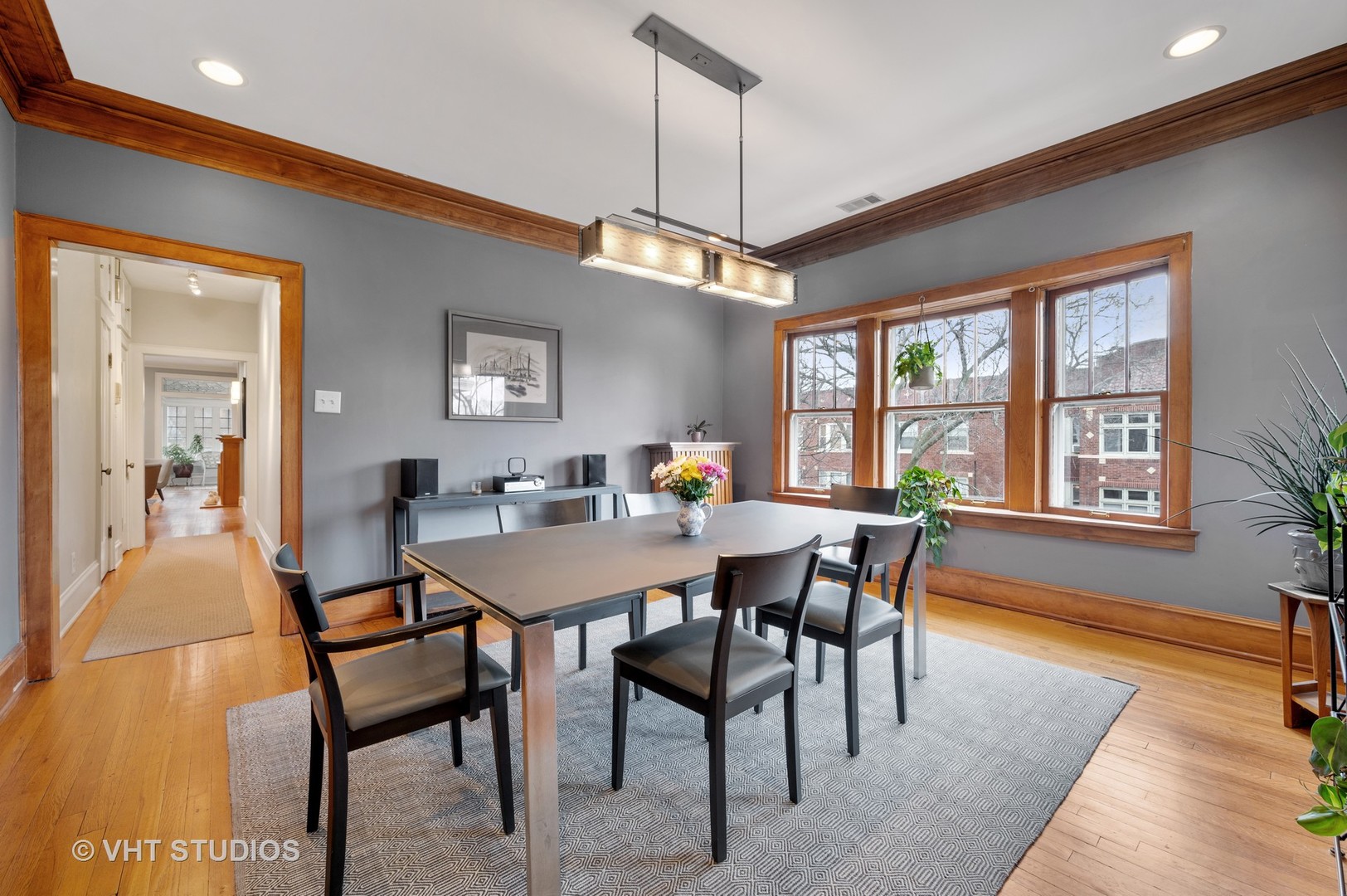 815 Ridge Avenue, Unit 3 Evanston, IL 60202 - Photo 8 of 16 a view of a dining room with furniture window and wooden floor