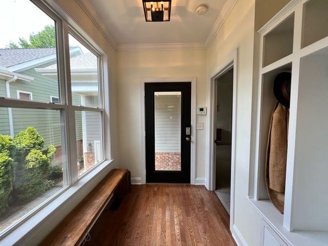 a view of a balcony with wooden floor