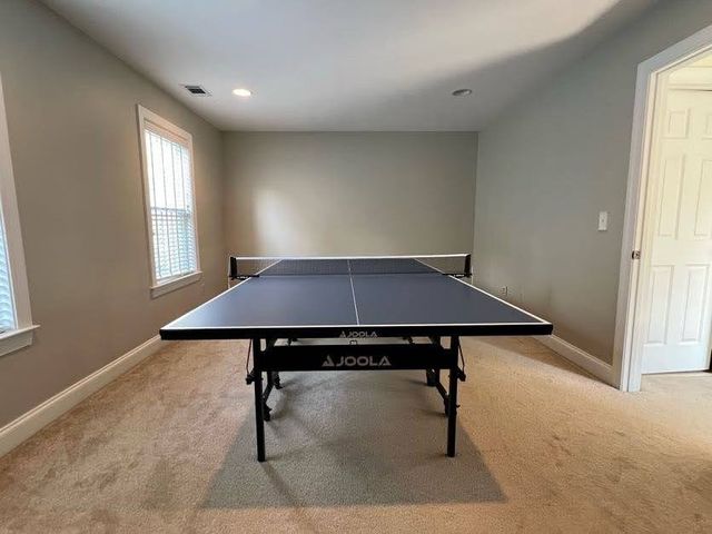 a view of a livingroom with furniture and window