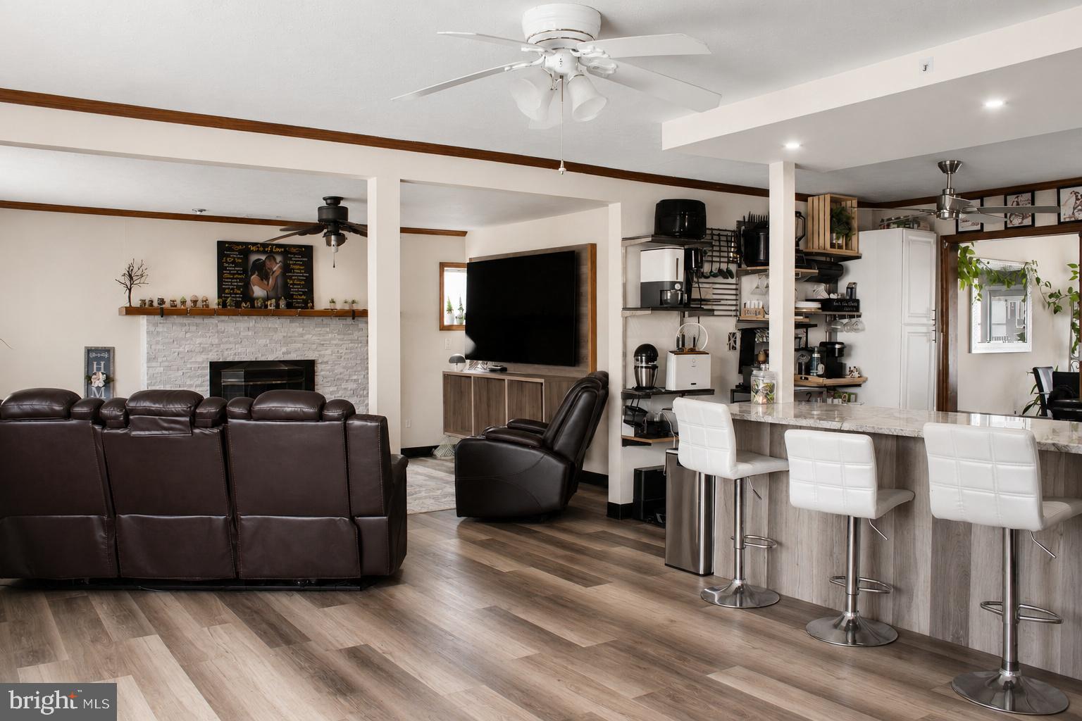 31 Micahill Road Levittown, PA 19056 - Photo 4 of 4 a living room with furniture and a flat screen tv