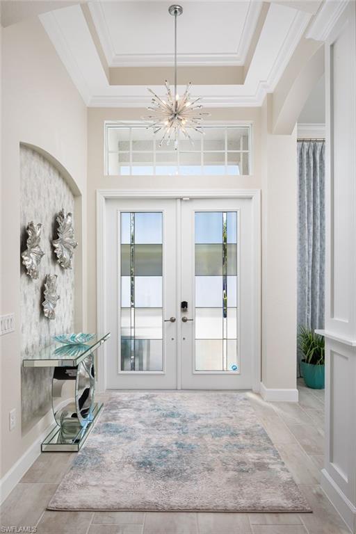 14627 Nicholas Way Naples, FL 34109 - Photo 11 of 27 a view of an empty room with a window