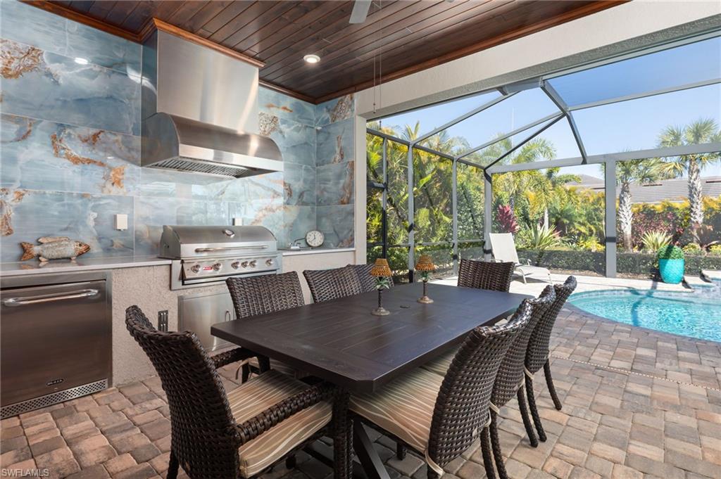 14627 Nicholas Way Naples, FL 34109 - Photo 20 of 27 a view of a dining room with furniture window and outside view