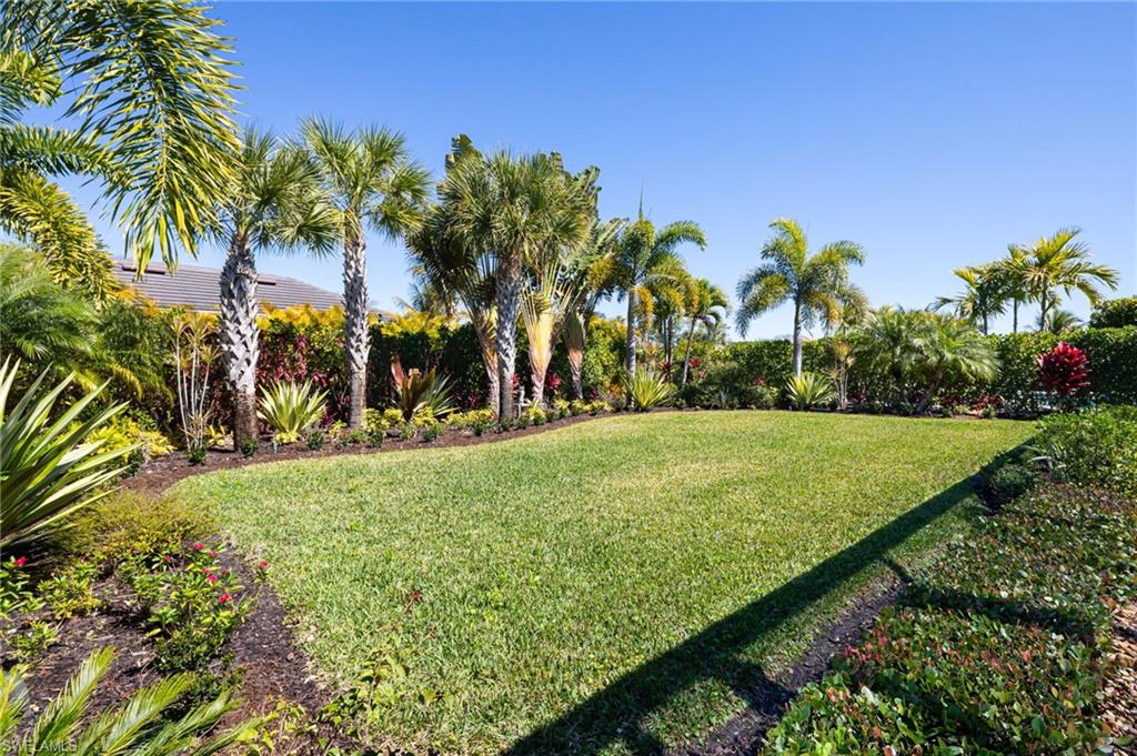 14627 Nicholas Way Naples, FL 34109 - Photo 25 of 27 a view of a park with palm trees