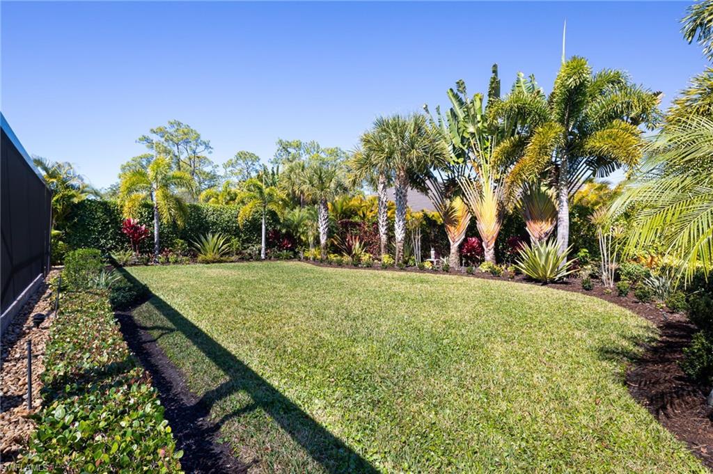 14627 Nicholas Way Naples, FL 34109 - Photo 26 of 27 a view of a park with large trees