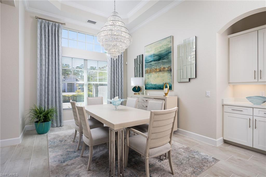 14627 Nicholas Way Naples, FL 34109 - Photo 10 of 27 a view of a dining room with furniture window and outside view
