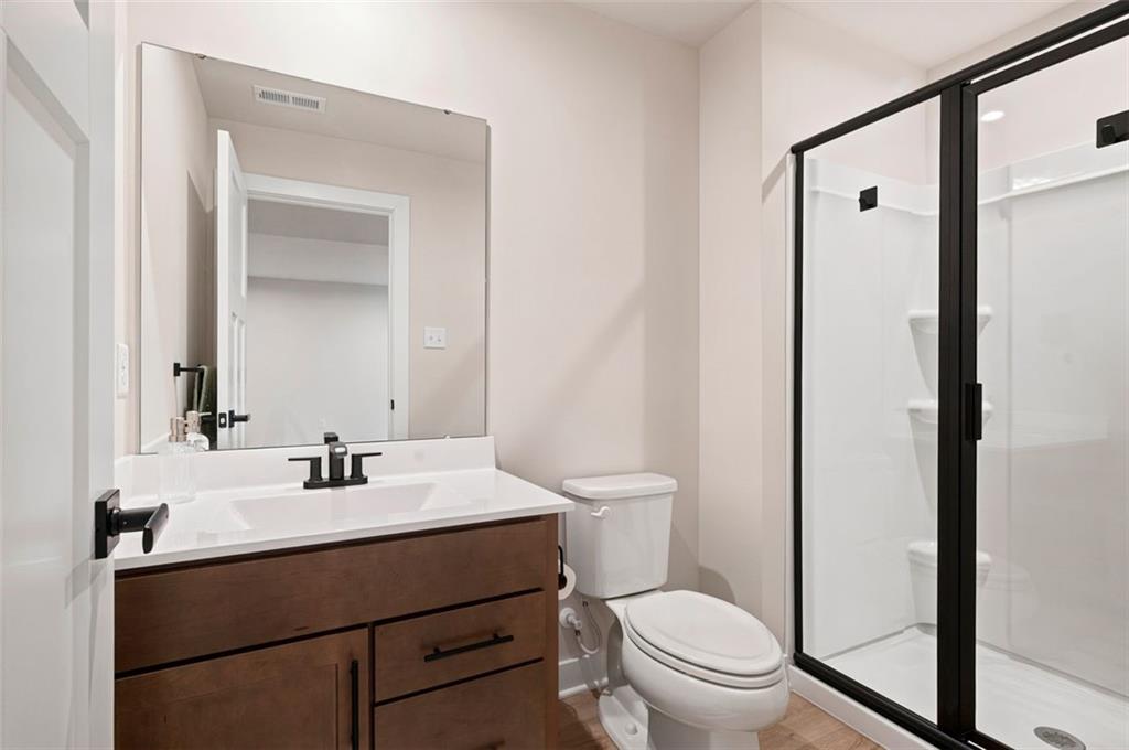 2001 Shelly Lane Mars, PA 16046 - Photo 34 of 39 a bathroom with a sink a toilet and a mirror