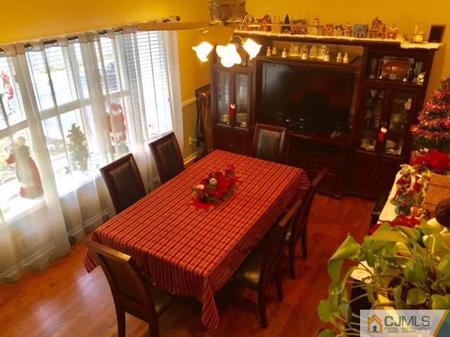 53 Albemarle Road Colonia, NJ 07067 - Photo 12 of 25 a dining room with furniture and window
