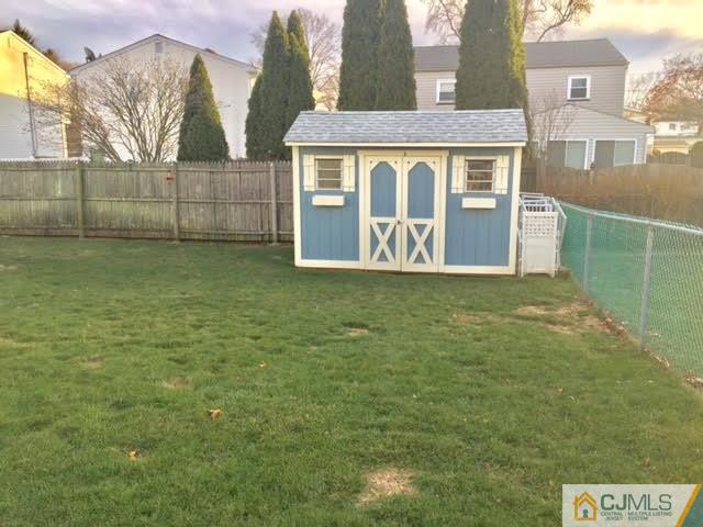 53 Albemarle Road Colonia, NJ 07067 - Photo 15 of 25 a view of front of house with a yard