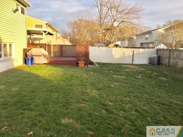 53 Albemarle Road Colonia, NJ 07067 - Photo 16 of 25 a view of backyard and house