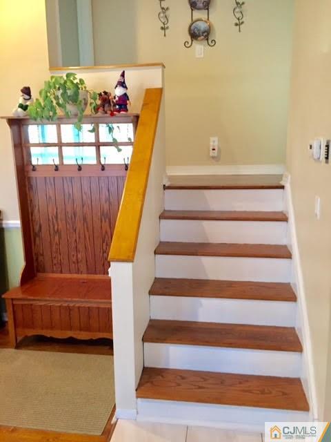 53 Albemarle Road Colonia, NJ 07067 - Photo 23 of 25 a view of entryway with stairs