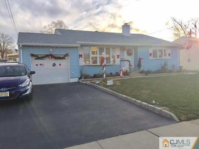 53 Albemarle Road Colonia, NJ 07067 - Photo 24 of 25 a view of a car park in front of house