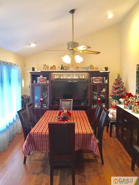 53 Albemarle Road Colonia, NJ 07067 - Photo 25 of 25 a view of a dinning table and chairs in patio
