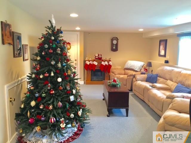 53 Albemarle Road Colonia, NJ 07067 - Photo 7 of 25 a living room with furniture and a potted plant