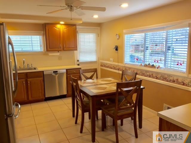 53 Albemarle Road Colonia, NJ 07067 - Photo 10 of 25 a kitchen that has a table and chairs in it