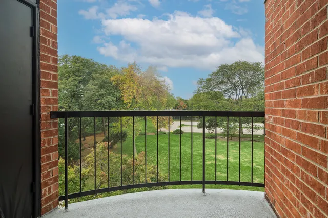 a view of a balcony with an outdoor space