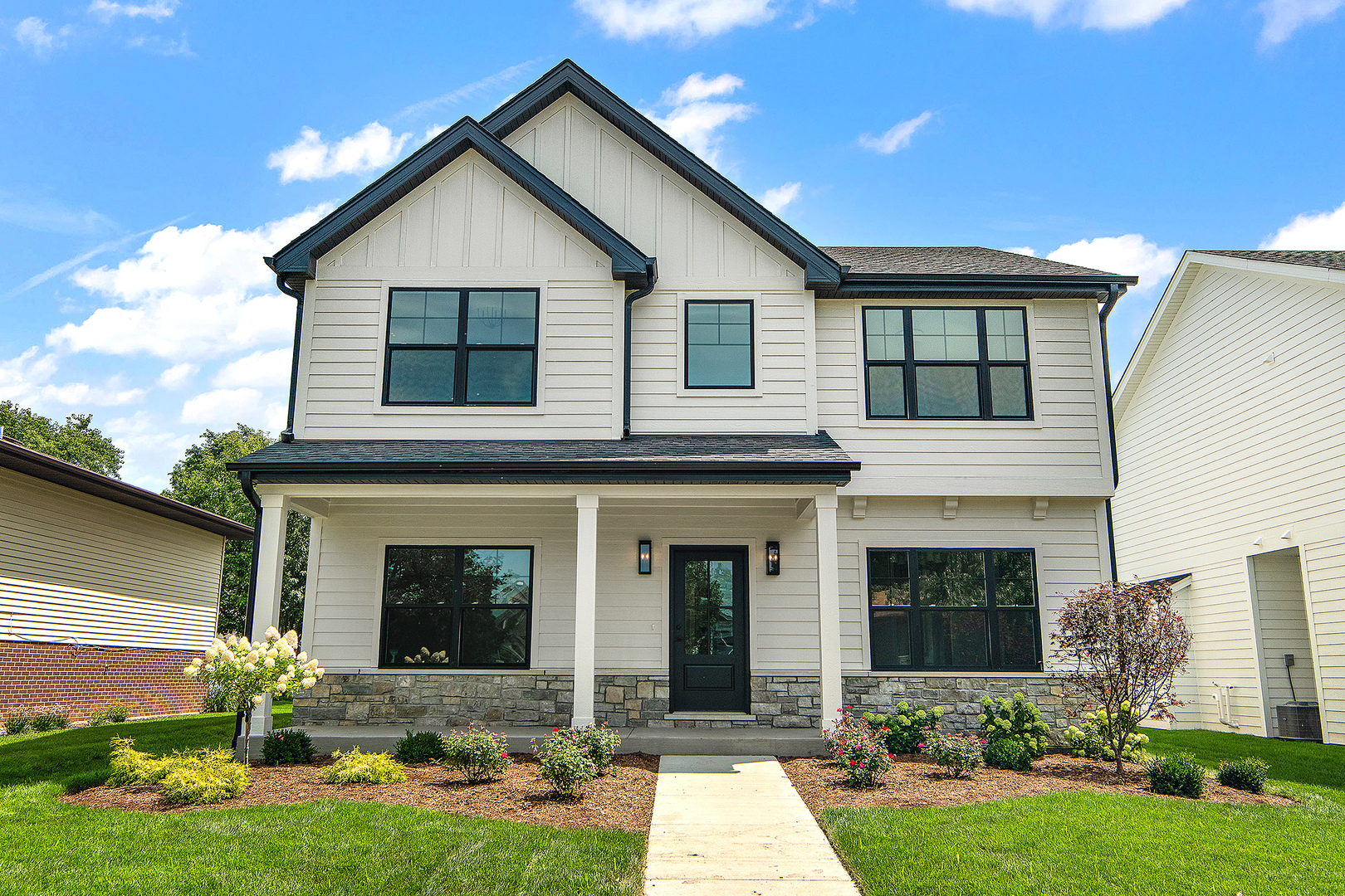 front view of a house with a yard