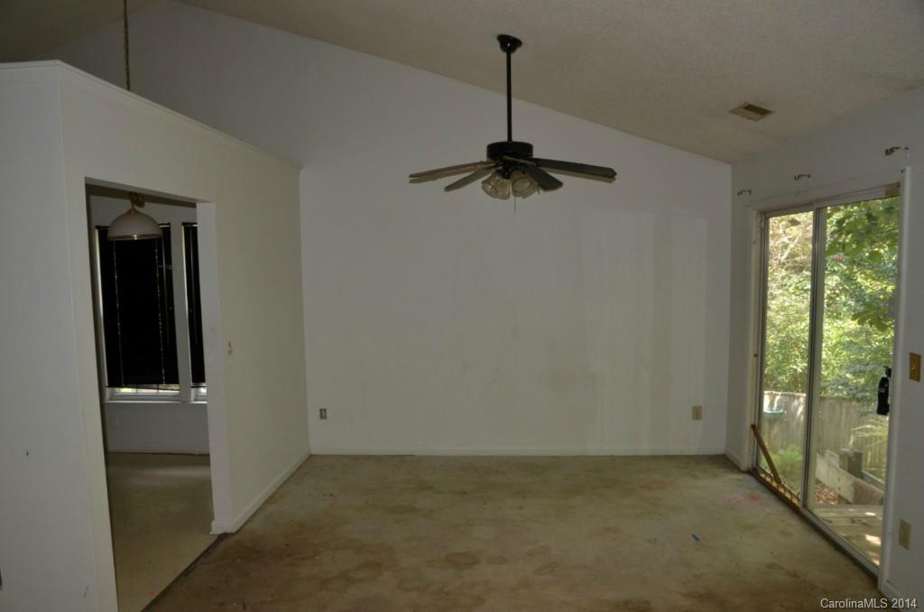 1932 Misty Vale Road Charlotte, NC 28214 - Photo 4 of 13 a view of an empty room and window