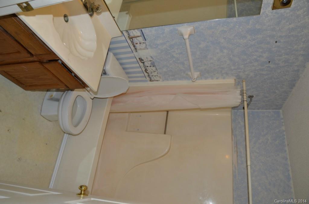 1932 Misty Vale Road Charlotte, NC 28214 - Photo 7 of 13 a bathroom with a shower