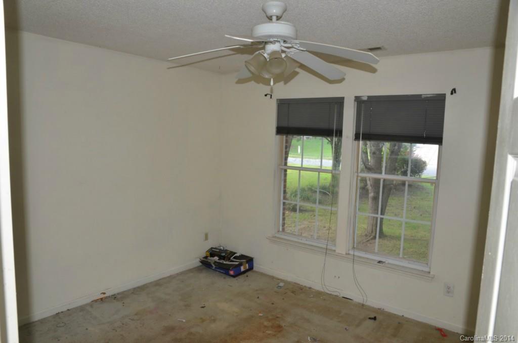 1932 Misty Vale Road Charlotte, NC 28214 - Photo 9 of 13 a view of an empty room with a window