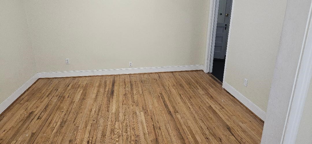 932 Walling Street Houston, TX 77009 - Photo 8 of 14 a view of wooden floor in a room
