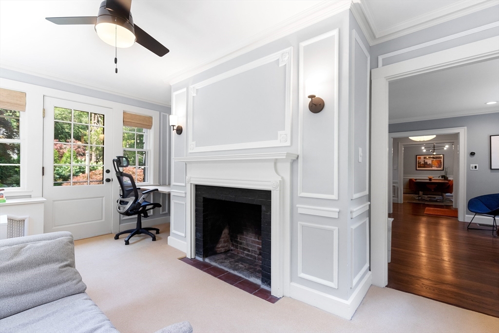 17 Swan Road Winchester, MA 01890 - Photo 17 of 41 a living room with furniture and a fireplace