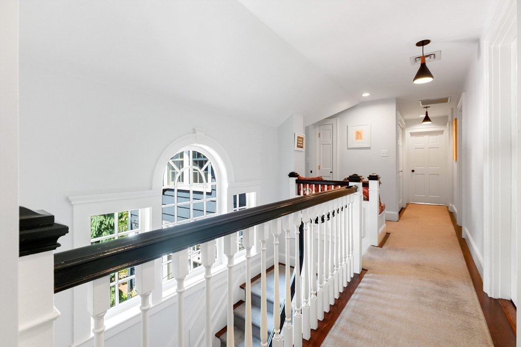 17 Swan Road Winchester, MA 01890 - Photo 20 of 41 a view of a hallway to a window
