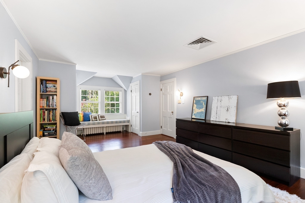 17 Swan Road Winchester, MA 01890 - Photo 22 of 41 a bedroom with a bed couch and window