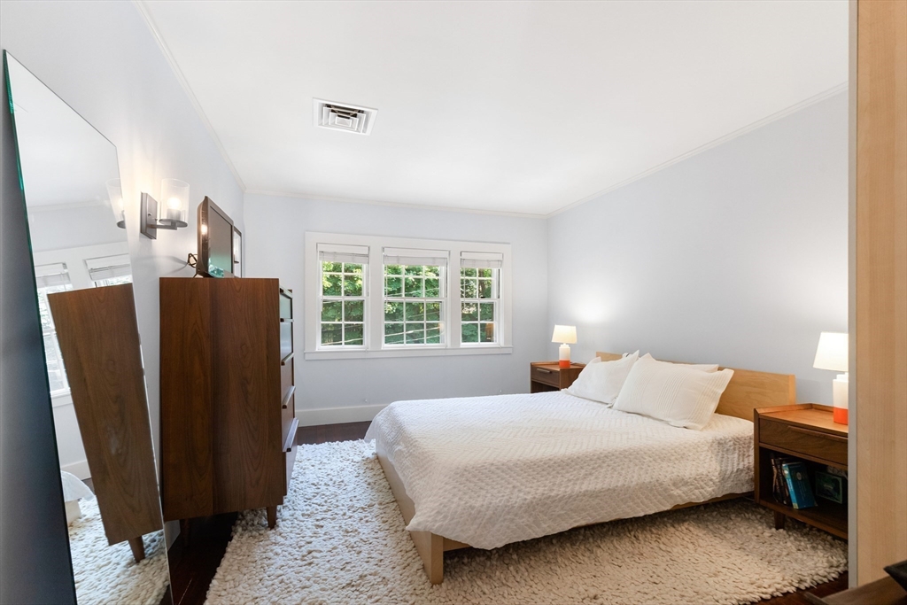 17 Swan Road Winchester, MA 01890 - Photo 28 of 41 a bedroom with bed and wooden floor