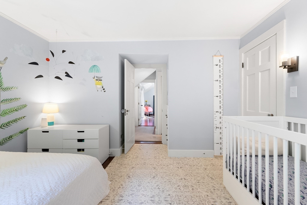 17 Swan Road Winchester, MA 01890 - Photo 30 of 41 a bedroom with a bed and a window