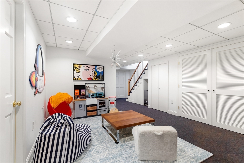 17 Swan Road Winchester, MA 01890 - Photo 34 of 41 a living room with furniture and a rug