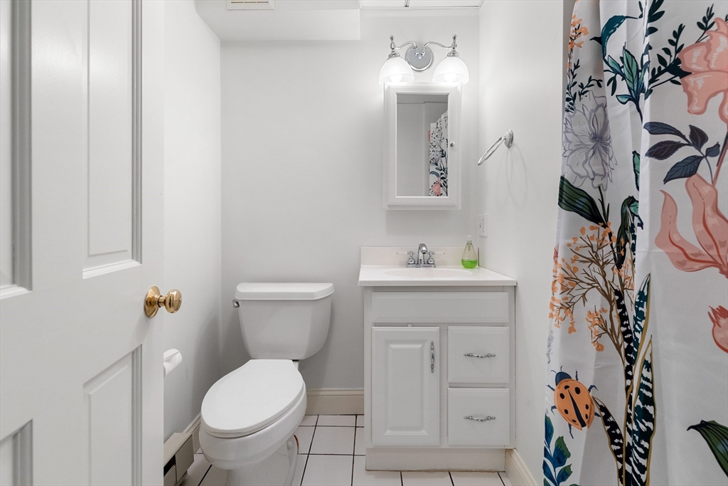 17 Swan Road Winchester, MA 01890 - Photo 35 of 41 a bathroom with a sink toilet and shower