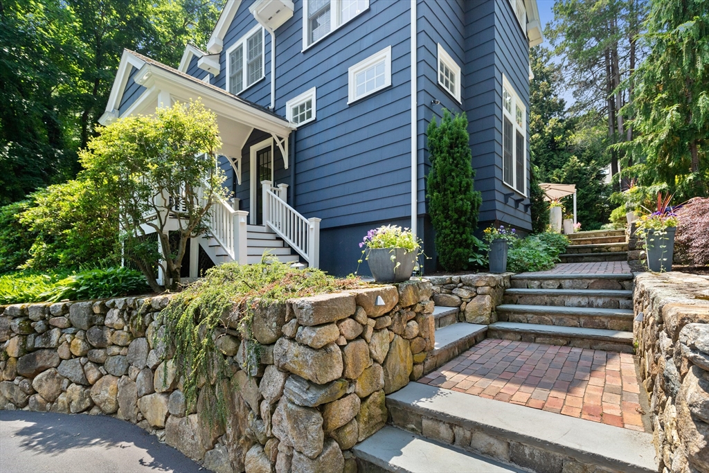 17 Swan Road Winchester, MA 01890 - Photo 36 of 41 a brick building with a large tree in front