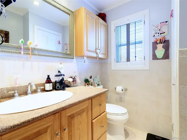 a bedroom with a bed and a cabinets