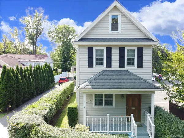 a view of a living room with lots of gym equipment
