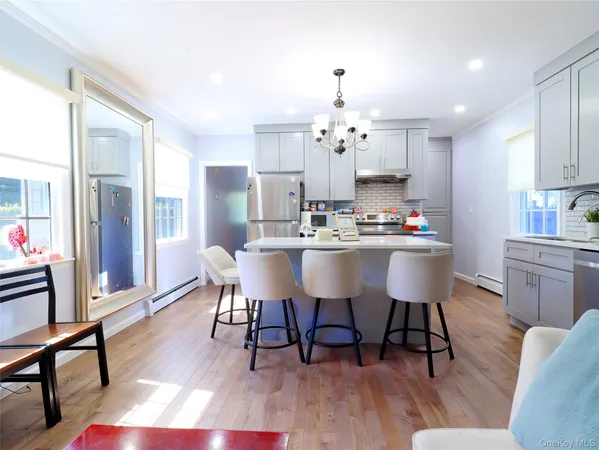 a bed room with a bed and a dresser